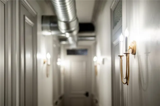 a close view of dining table with chairs