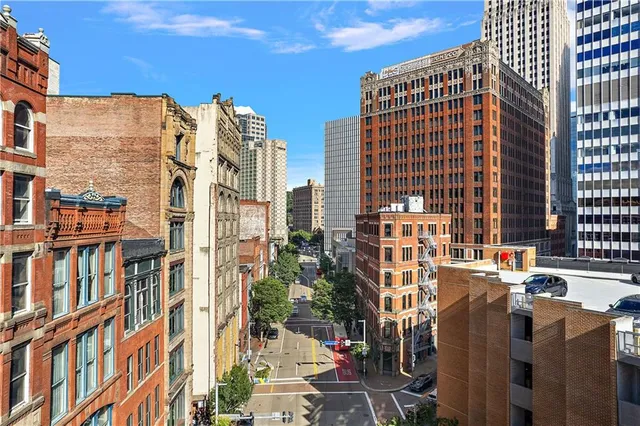 a city view with tall buildings