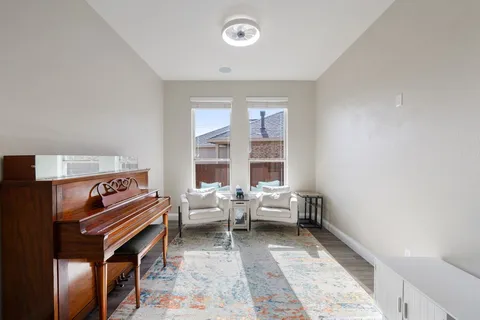 a living room with furniture and a window