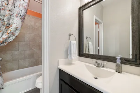 a bathroom with a sink and a bathtub