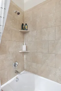 a bathroom with a bathtub