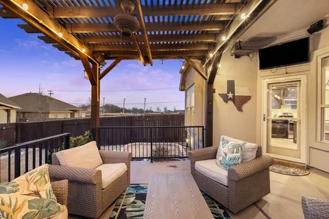 a balcony with furniture