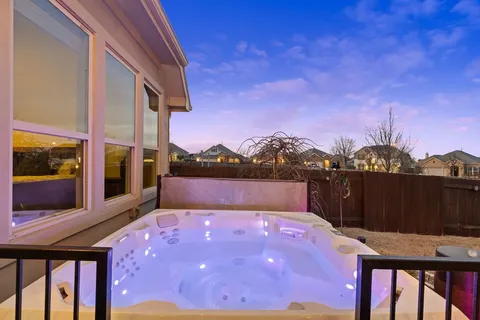 a view of balcony with furniture