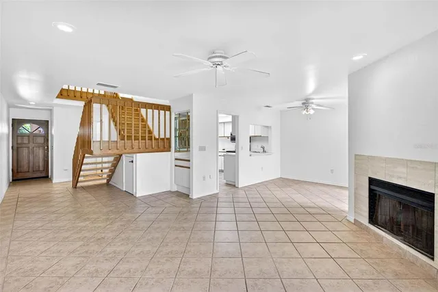 a view of a kitchen with a sink and a stove top oven