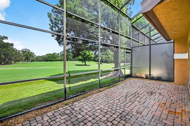 a view of a yard with a house