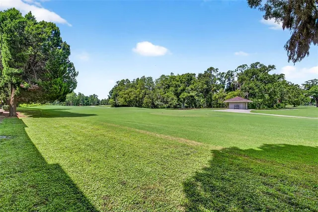 a view of a golf course with a garden