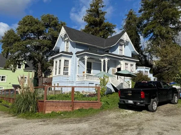 front view of a house with a small yard
