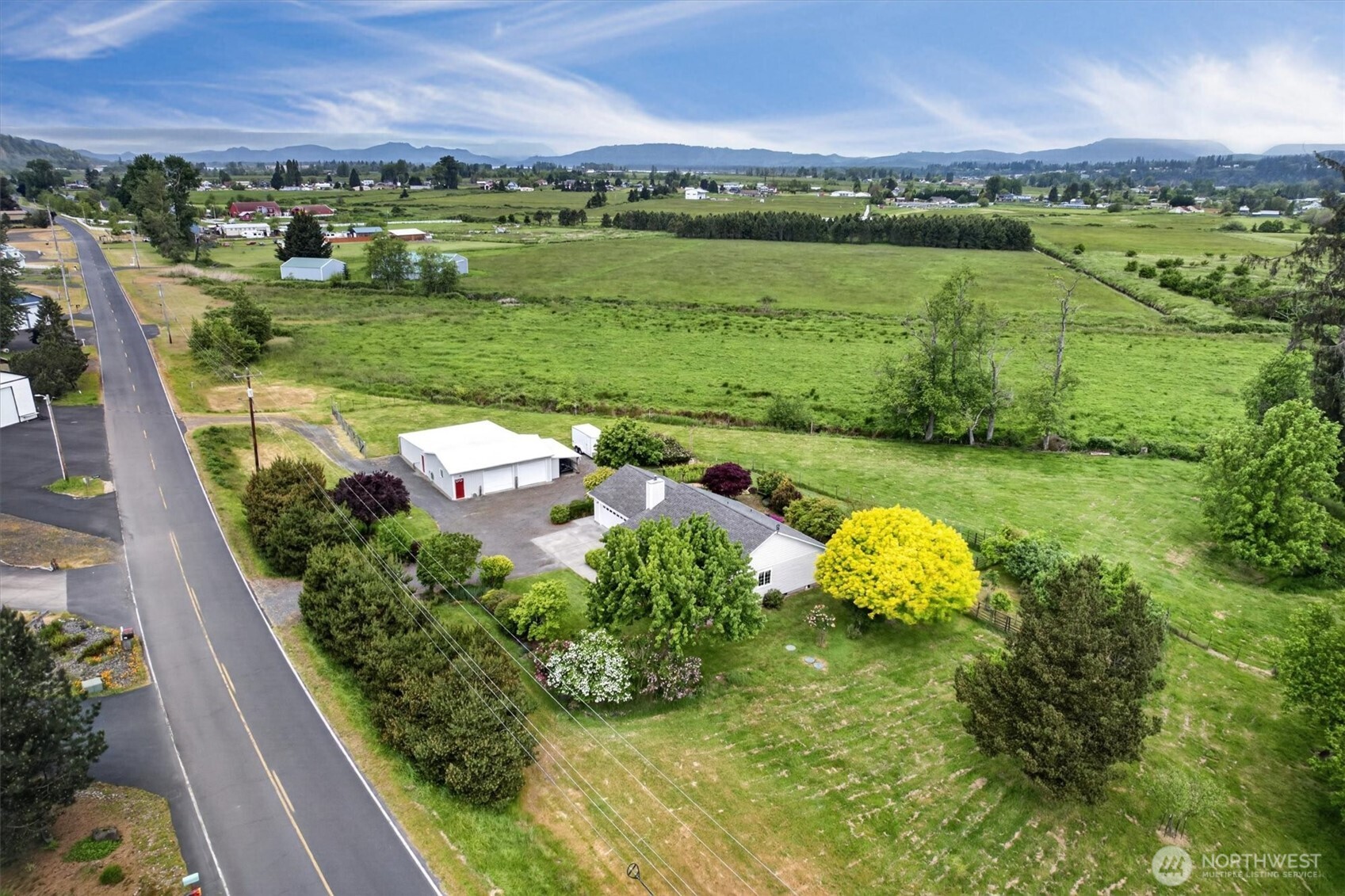 218 West Sunny Sands Road Cathlamet, WA 98612 - Photo 38 of 40 an aerial view of a house with a garden and lake view