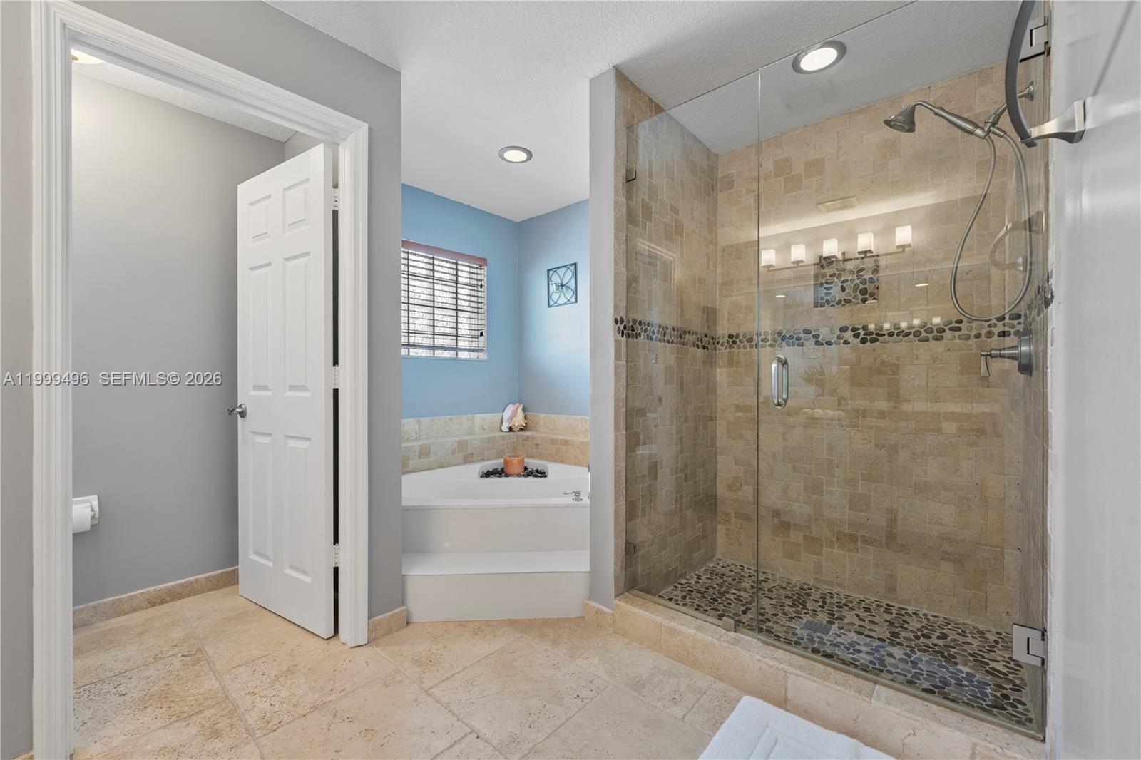 20918 Southwest 89th Path Cutler Bay, FL 33189 - Photo 24 of 47 a bathroom with a shower