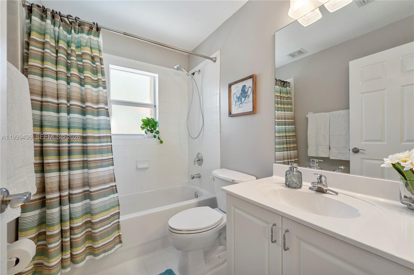 20918 Southwest 89th Path Cutler Bay, FL 33189 - Photo 30 of 47 a bathroom with a sink toilet and shower