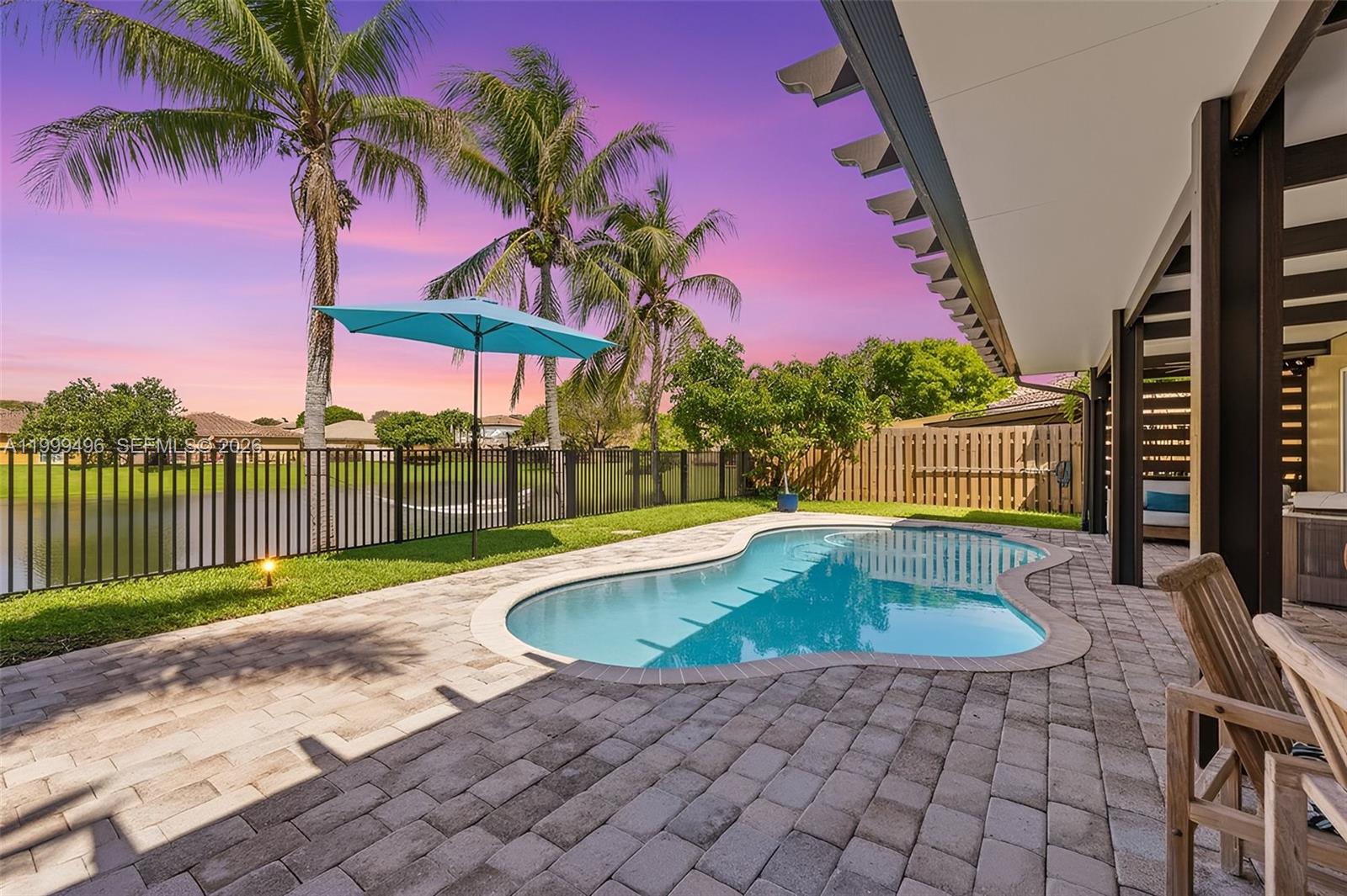 20918 Southwest 89th Path Cutler Bay, FL 33189 - Photo 3 of 47 a view of outdoor space yard and swimming pool