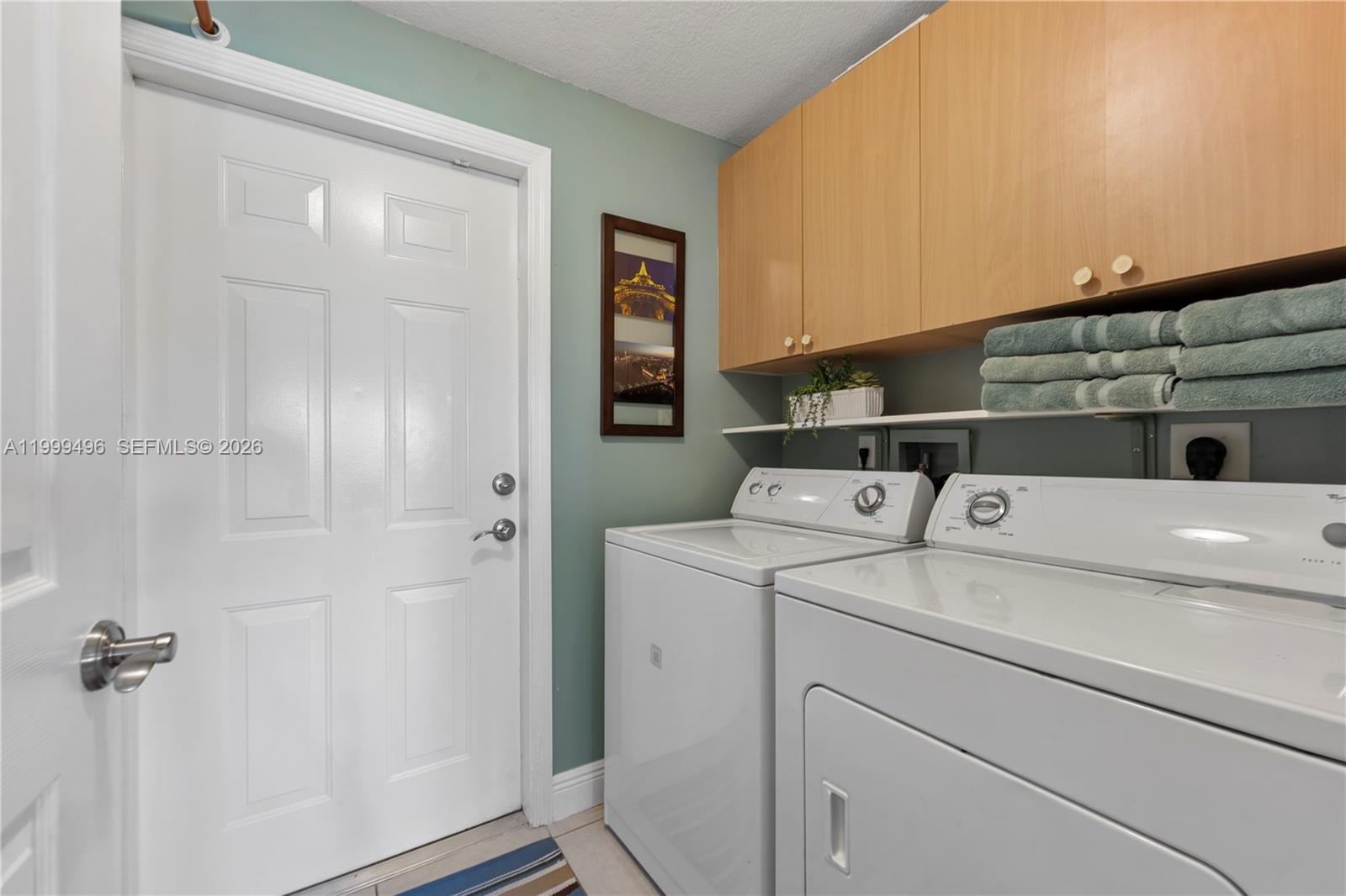 20918 Southwest 89th Path Cutler Bay, FL 33189 - Photo 31 of 47 a utility room with dryer and washer