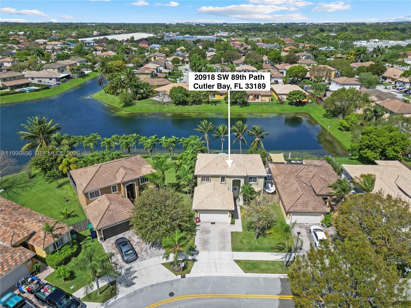 20918 Southwest 89th Path Cutler Bay, FL 33189 - Photo 42 of 47 an aerial view of residential houses with outdoor space and river