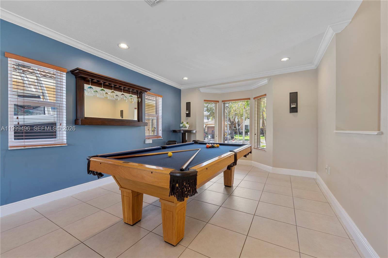 20918 Southwest 89th Path Cutler Bay, FL 33189 - Photo 8 of 47 a room with furniture pool table and windows