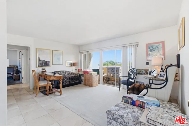 a kitchen with cabinets and window