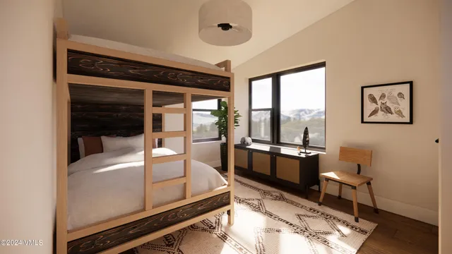 a room with wooden floor and furniture