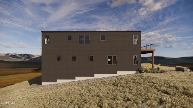 a view of a backyard of the house