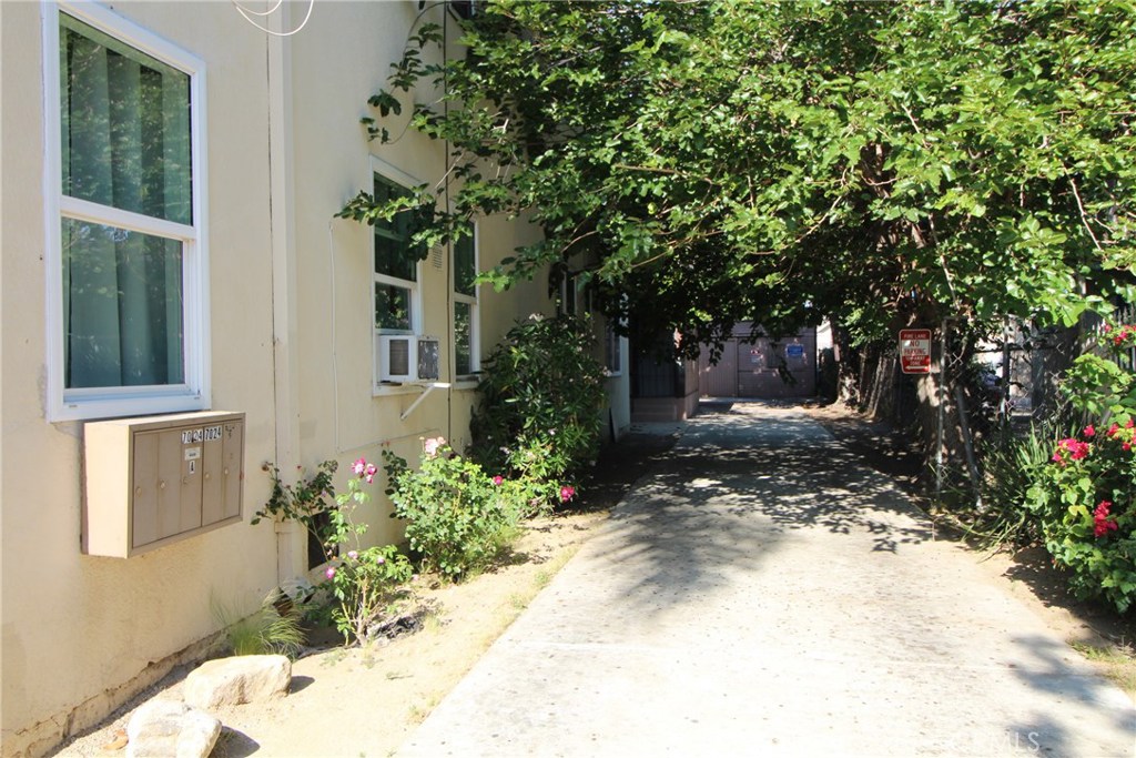 7024 Middleton Street, Unit B Huntington Park, CA 90255 - Photo 2 of 8 a view of a house with a yard