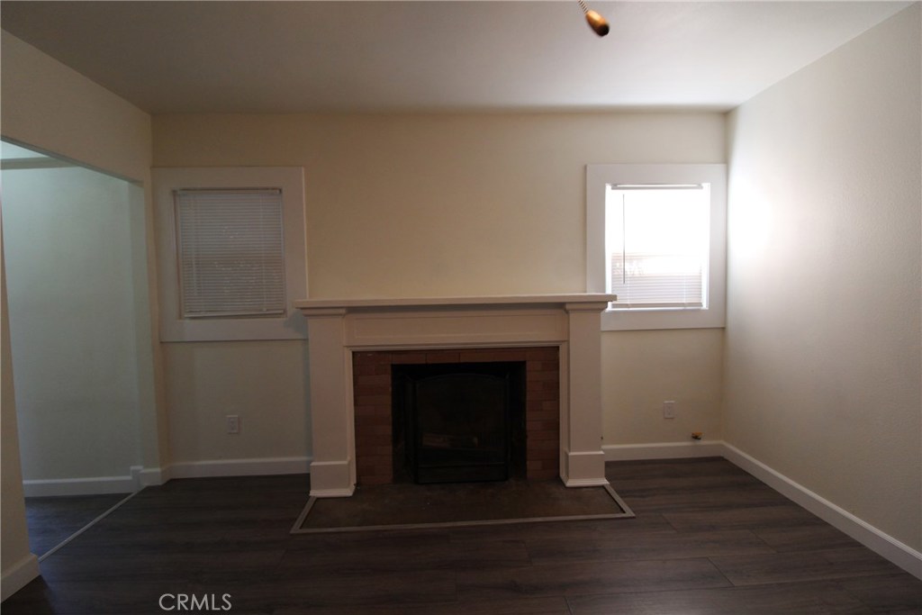 7024 Middleton Street, Unit B Huntington Park, CA 90255 - Photo 6 of 8 a living room with a fireplace