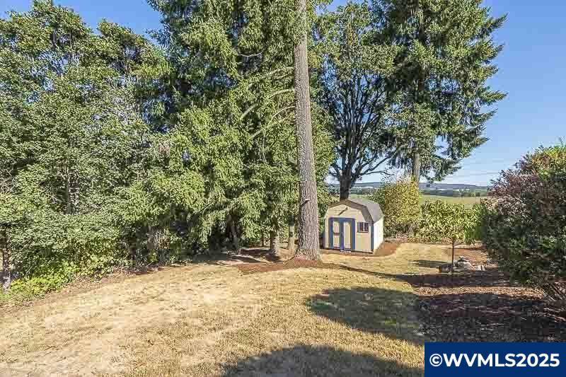 11660 Simpson Road Monmouth, OR 97361 - Photo 36 of 50 a front view of a house with a yard