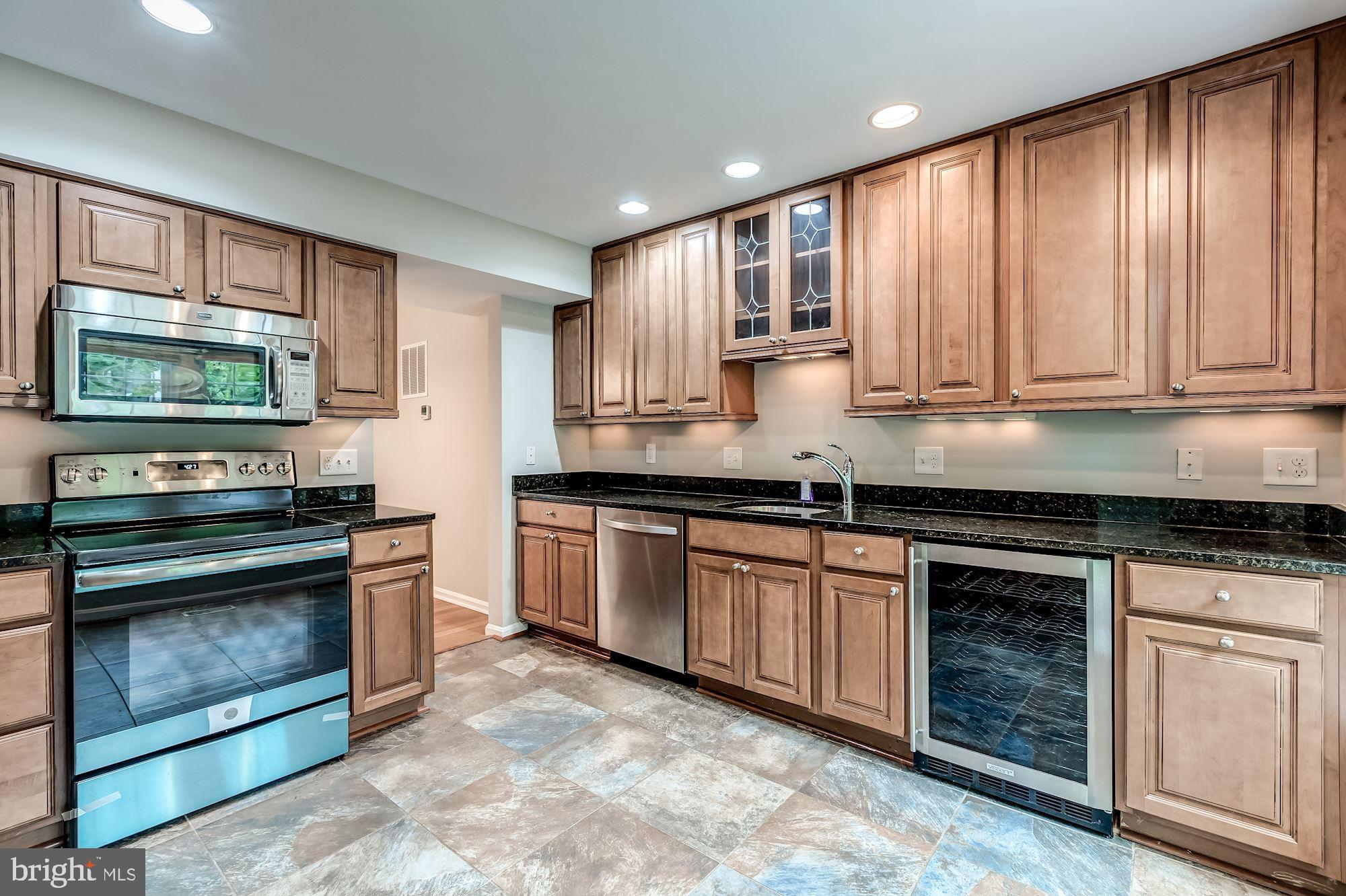 Newly renovated kitchen with granite counter tops