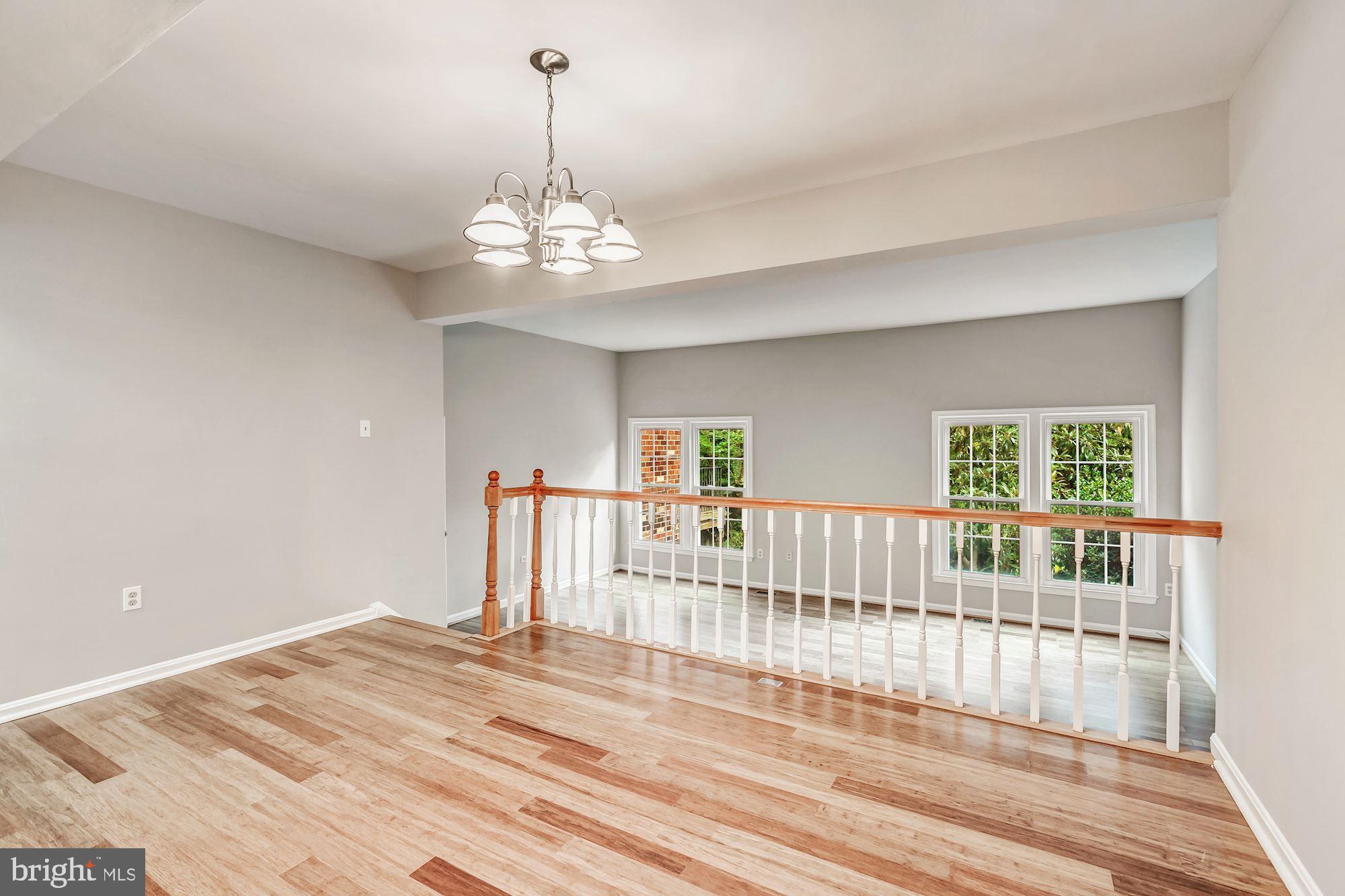 2183 Greenkeepers Court Reston, VA 20191 - Photo 10 of 30 New hardwood floors throughout main level