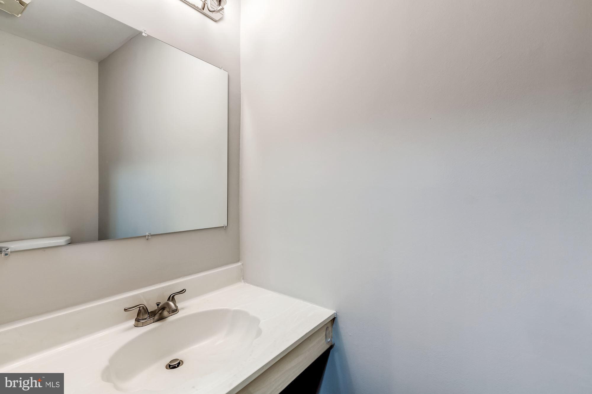 2183 Greenkeepers Court Reston, VA 20191 - Photo 13 of 30 Half bath on main level