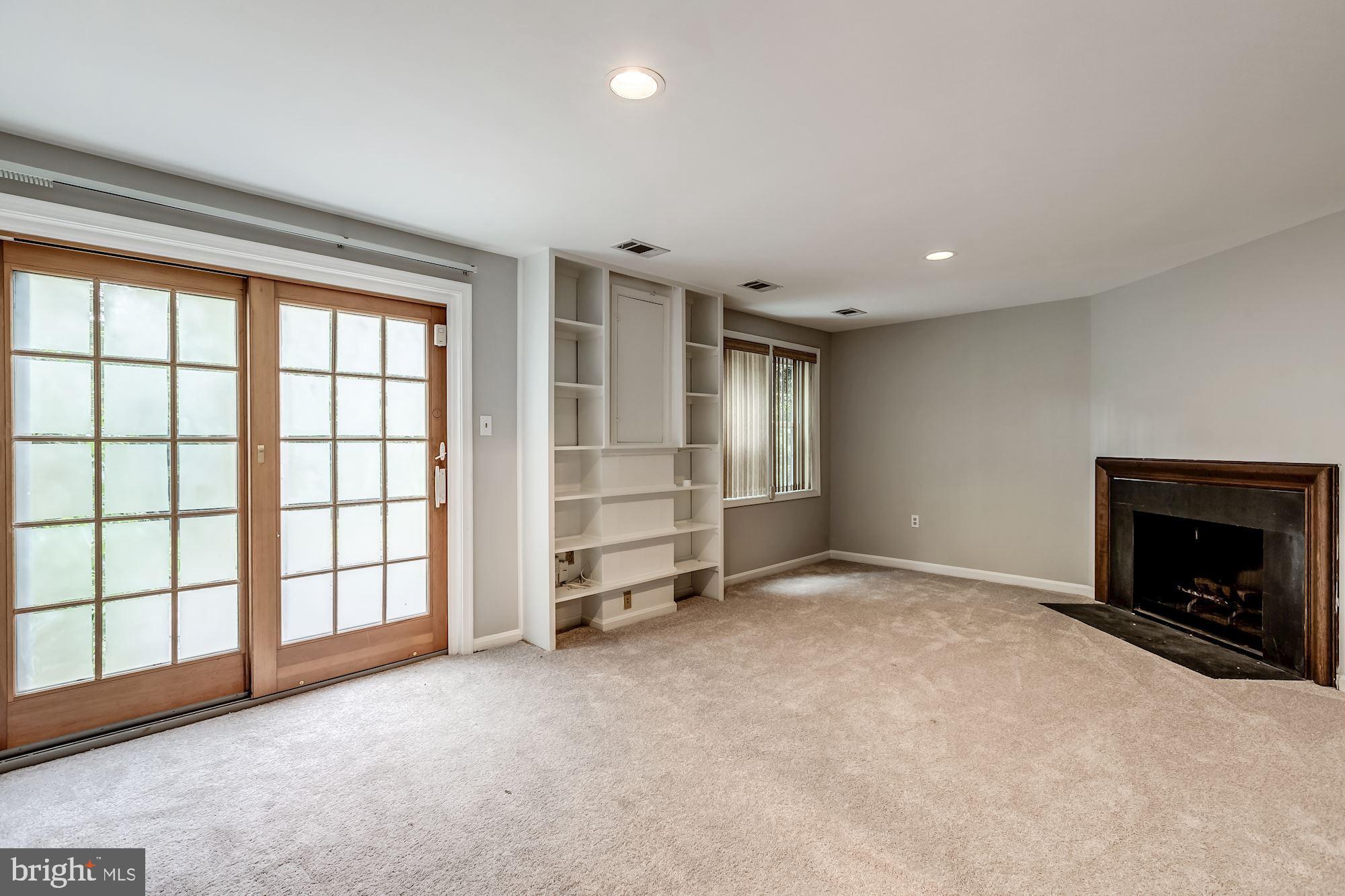 2183 Greenkeepers Court Reston, VA 20191 - Photo 23 of 30 Lower level rec room with sliding door to patio