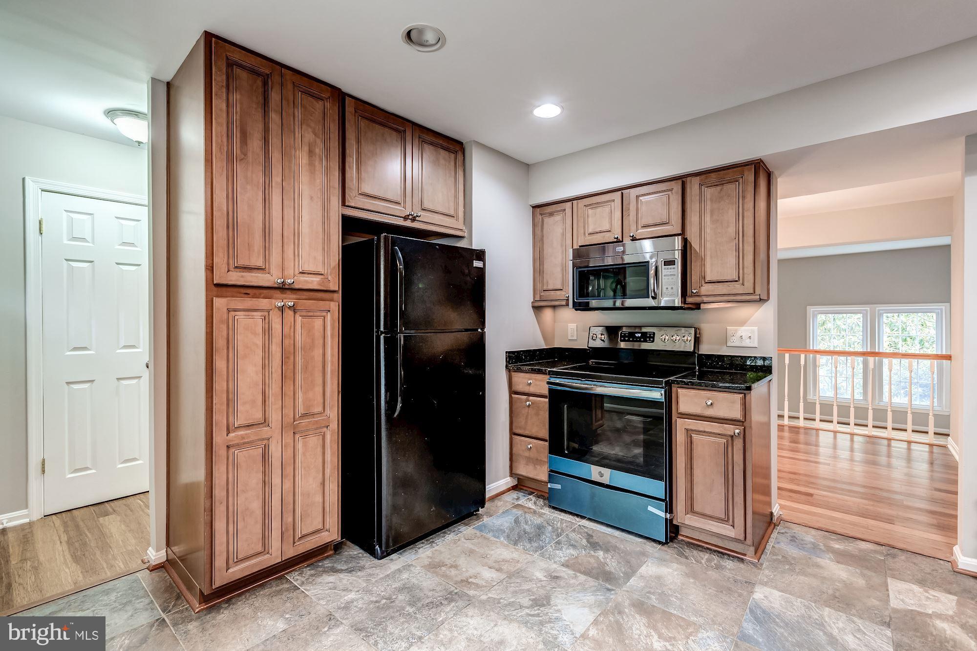 All new appliances and tile flooring in kitchen