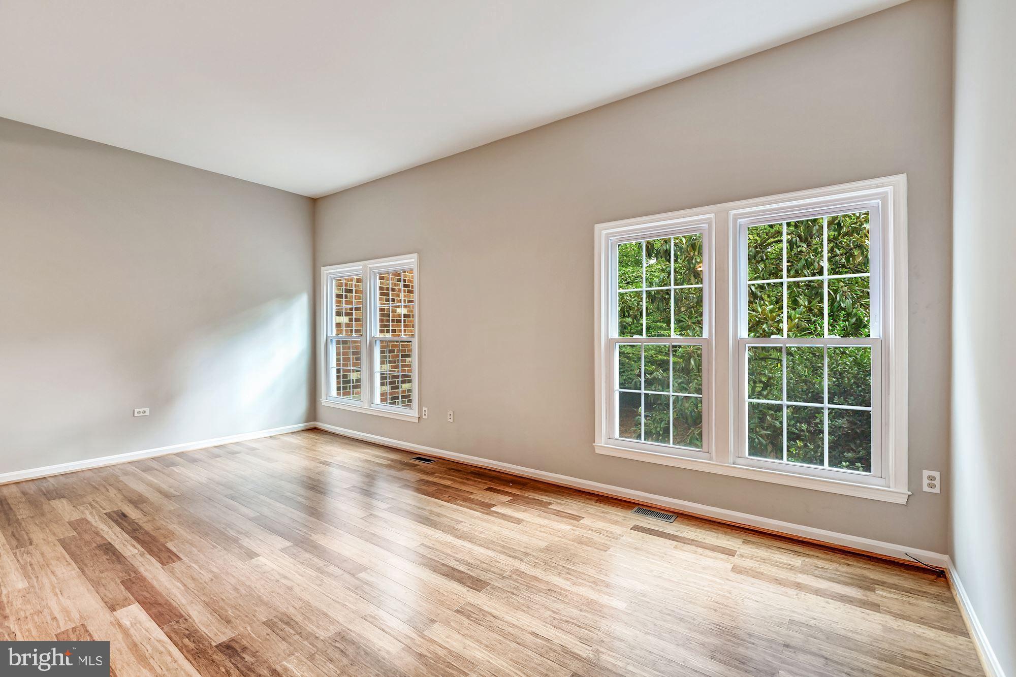 Open living room with new hardwood floors