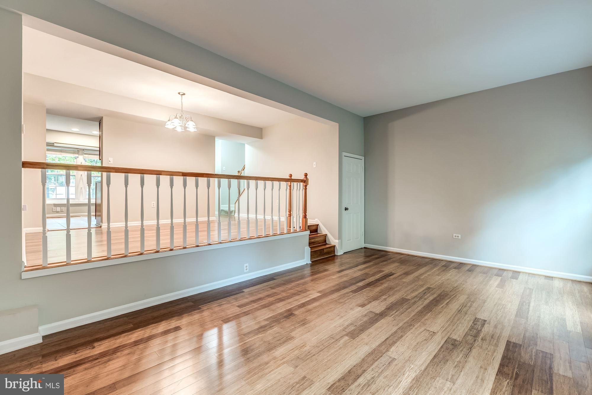 2183 Greenkeepers Court Reston, VA 20191 - Photo 8 of 30 Living room looking into the dining room
