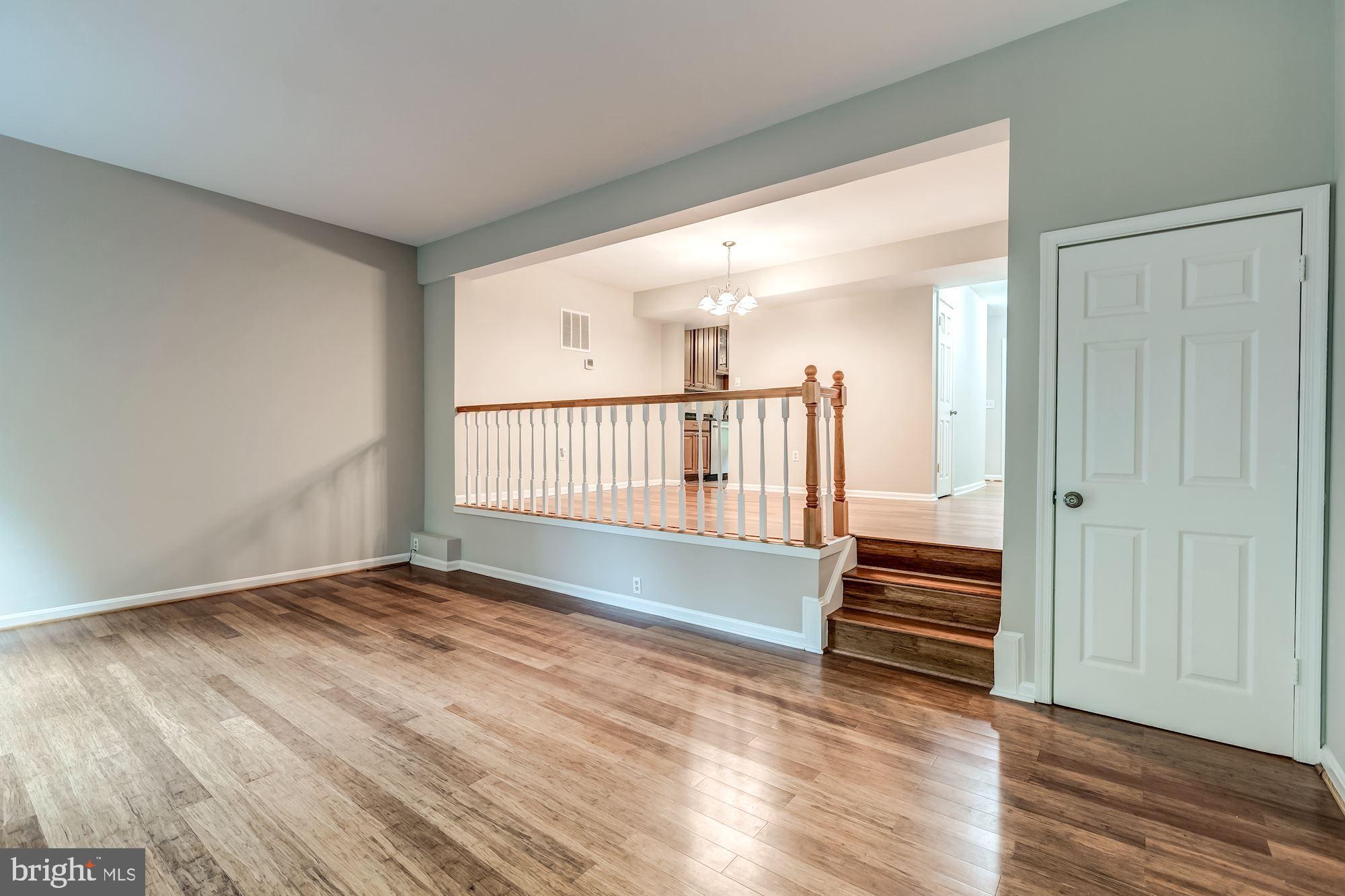 2183 Greenkeepers Court Reston, VA 20191 - Photo 9 of 30 Living room area with coat closet
