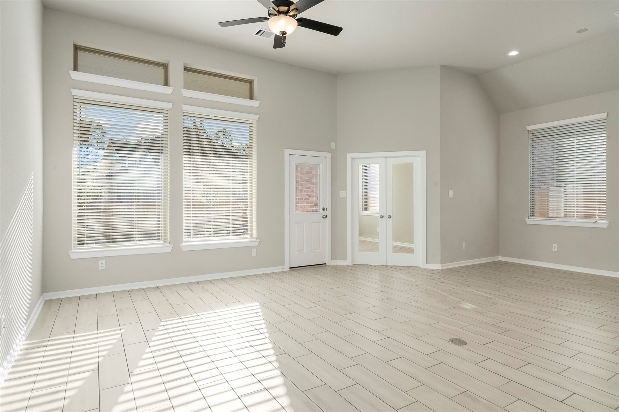 107 Yellow Perch Way Conroe, TX 77318 - Photo 11 of 36 a view of an empty room with a window