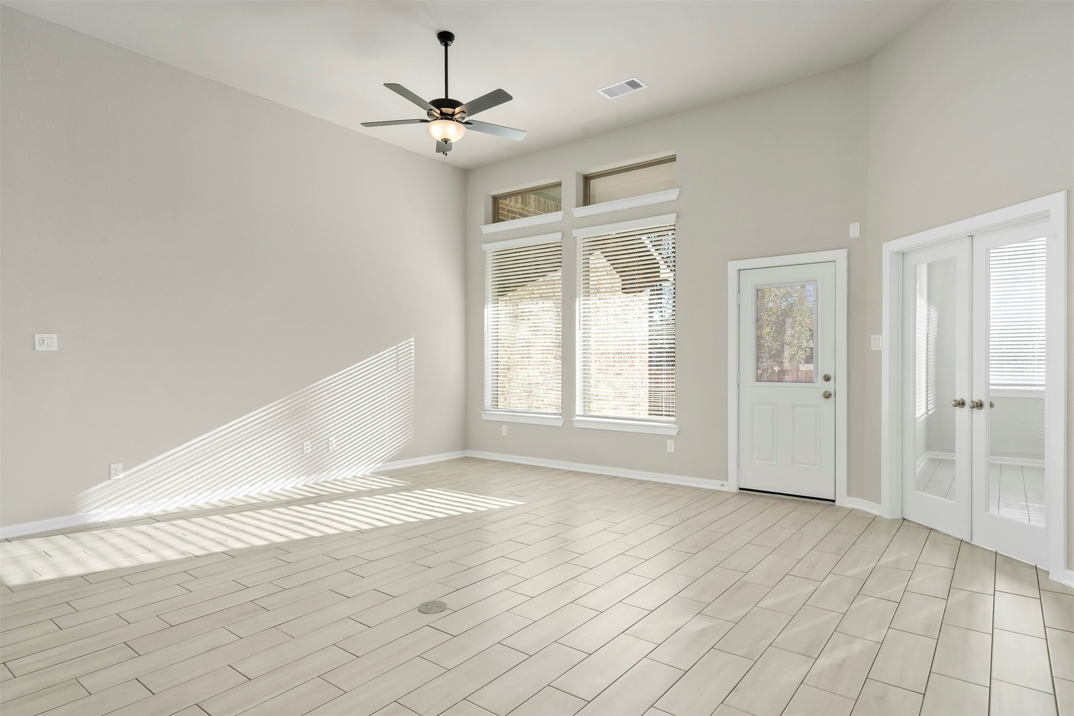 107 Yellow Perch Way Conroe, TX 77318 - Photo 12 of 36 a view of an empty room with a window