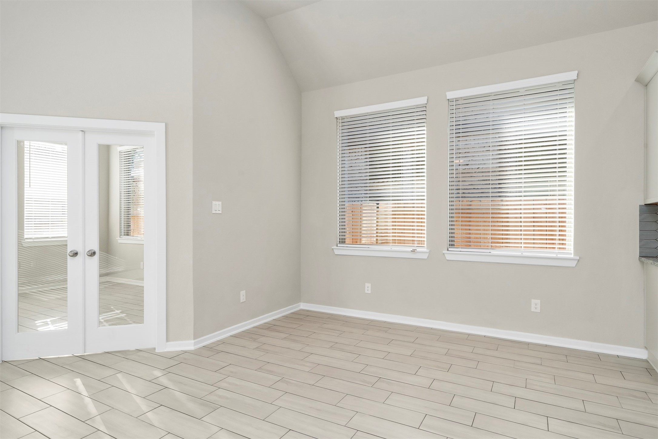 107 Yellow Perch Way Conroe, TX 77318 - Photo 13 of 36 a view of an empty room with a window