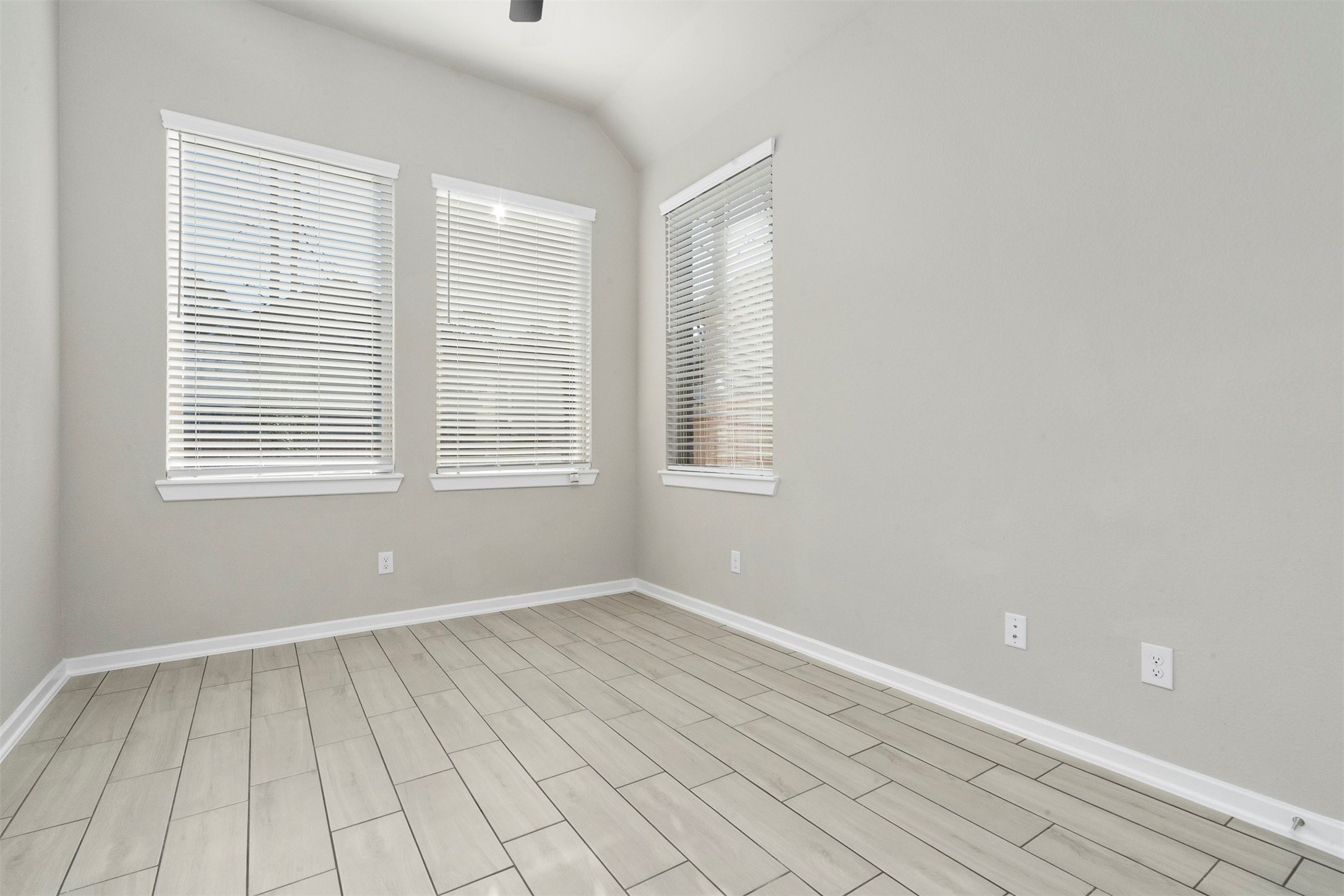 107 Yellow Perch Way Conroe, TX 77318 - Photo 14 of 36 a view of an empty room with a window
