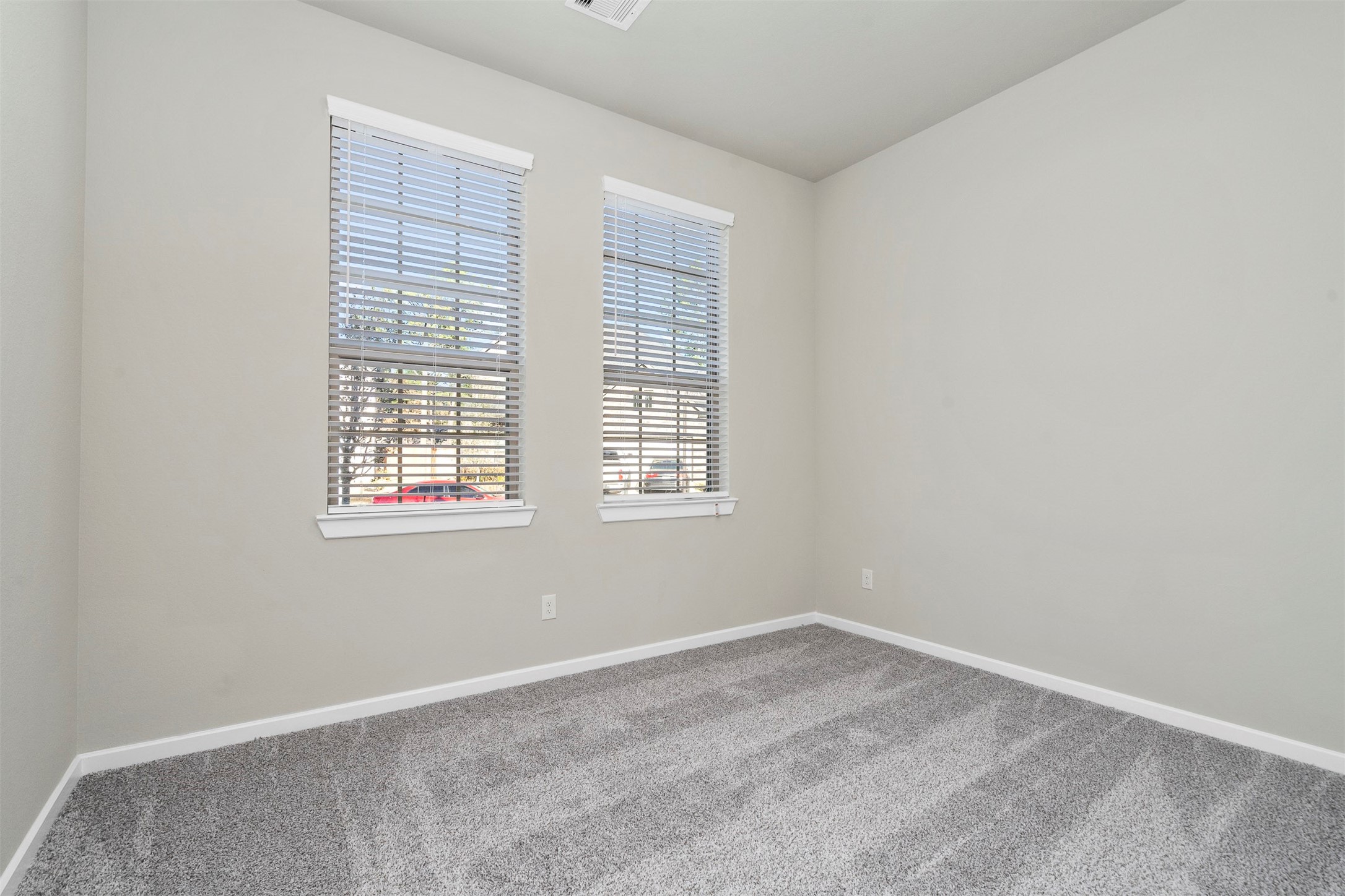 107 Yellow Perch Way Conroe, TX 77318 - Photo 15 of 36 an empty room with a window