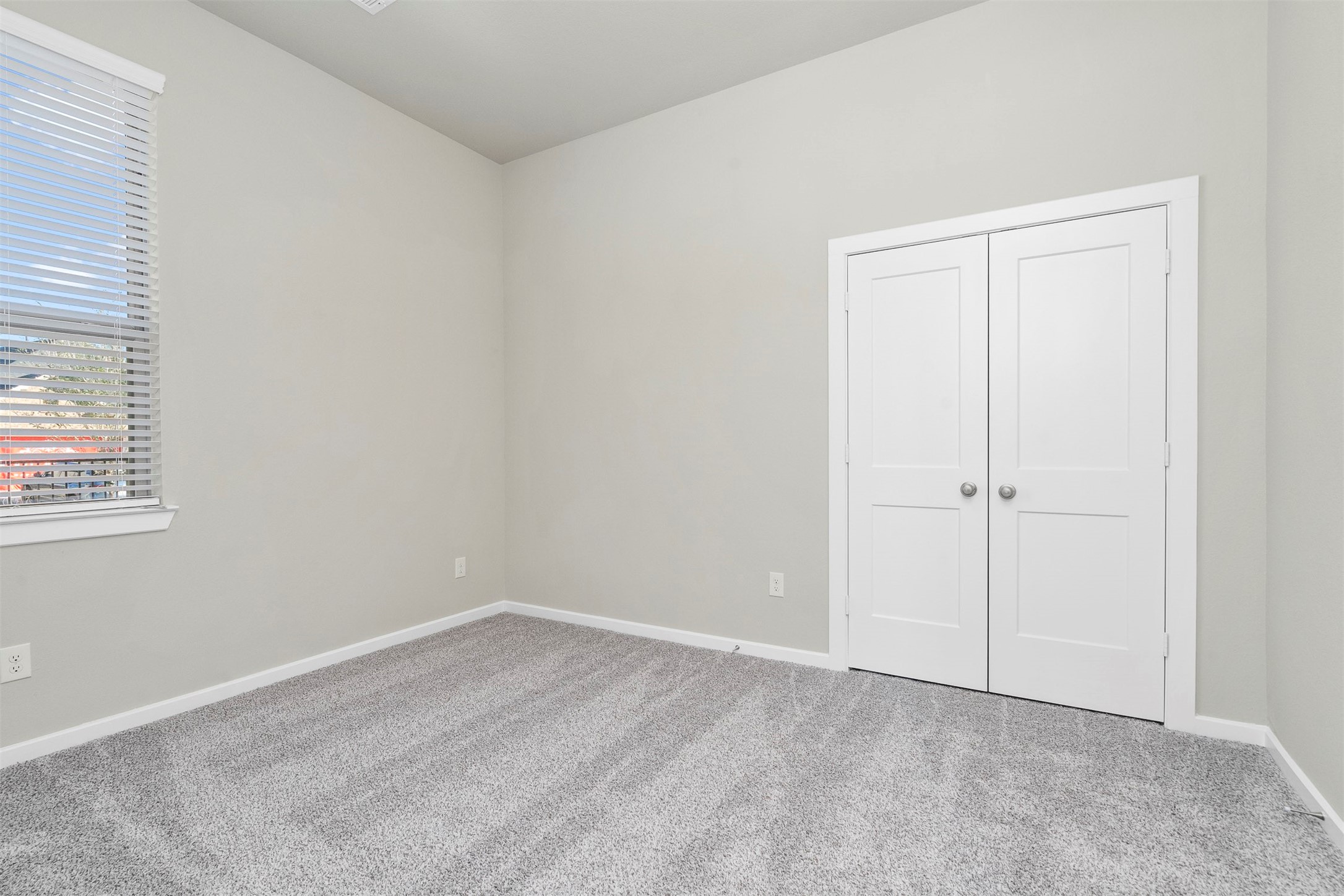 107 Yellow Perch Way Conroe, TX 77318 - Photo 17 of 36 an empty room with a empty space and window