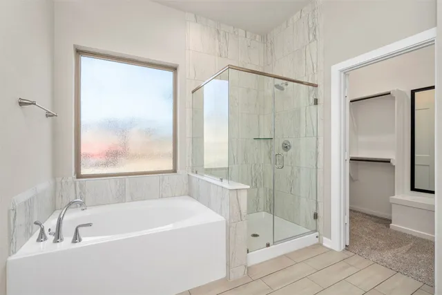 a bathroom with a double vanity sink and mirror