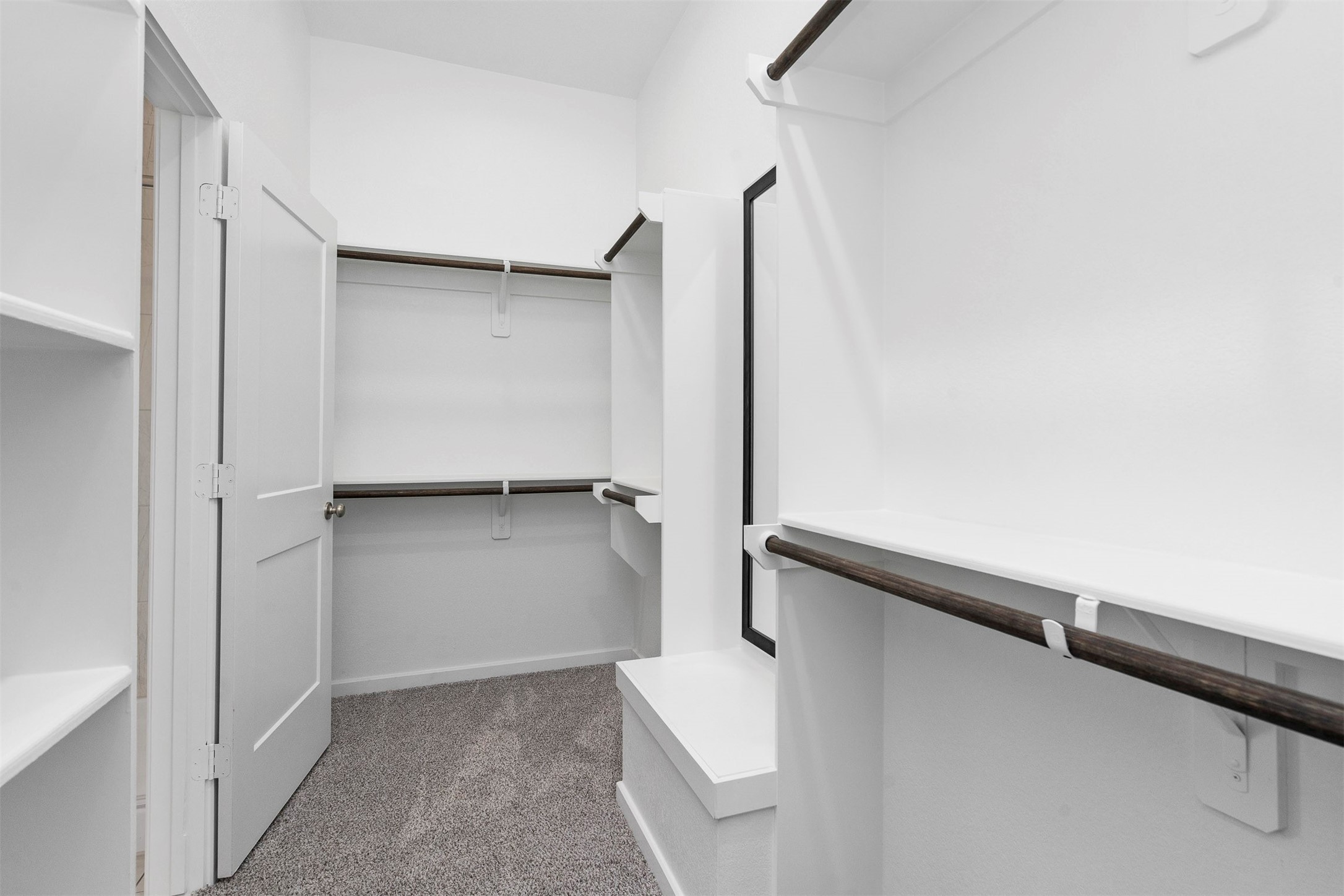 107 Yellow Perch Way Conroe, TX 77318 - Photo 24 of 36 a view of walk in closet