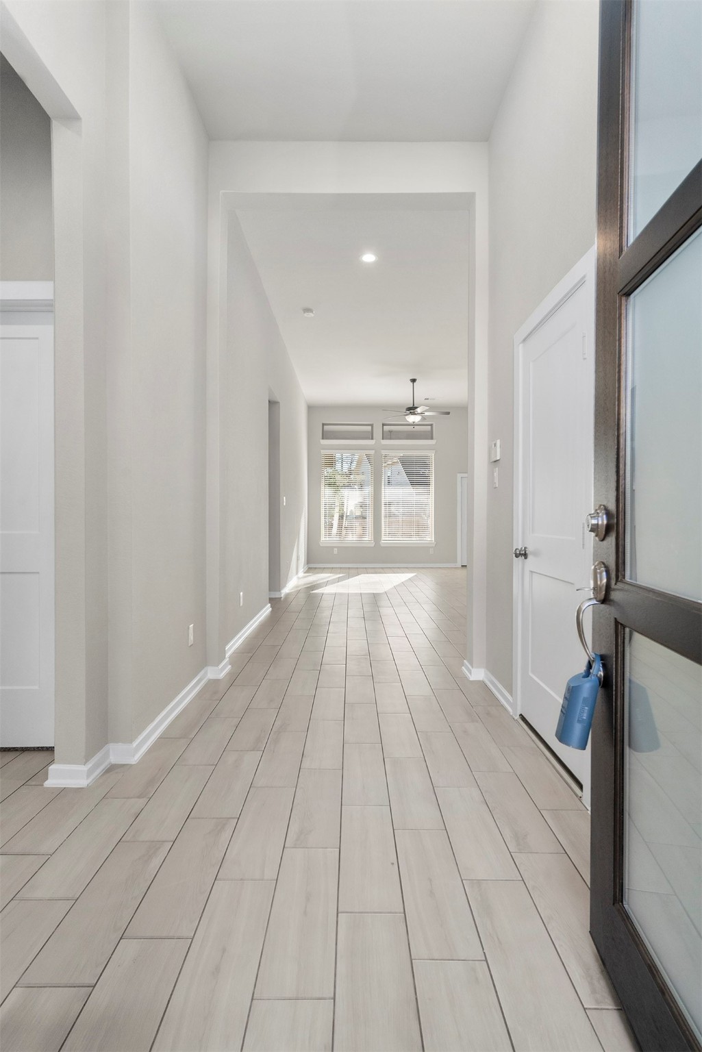107 Yellow Perch Way Conroe, TX 77318 - Photo 5 of 36 a view of a living room with a large window