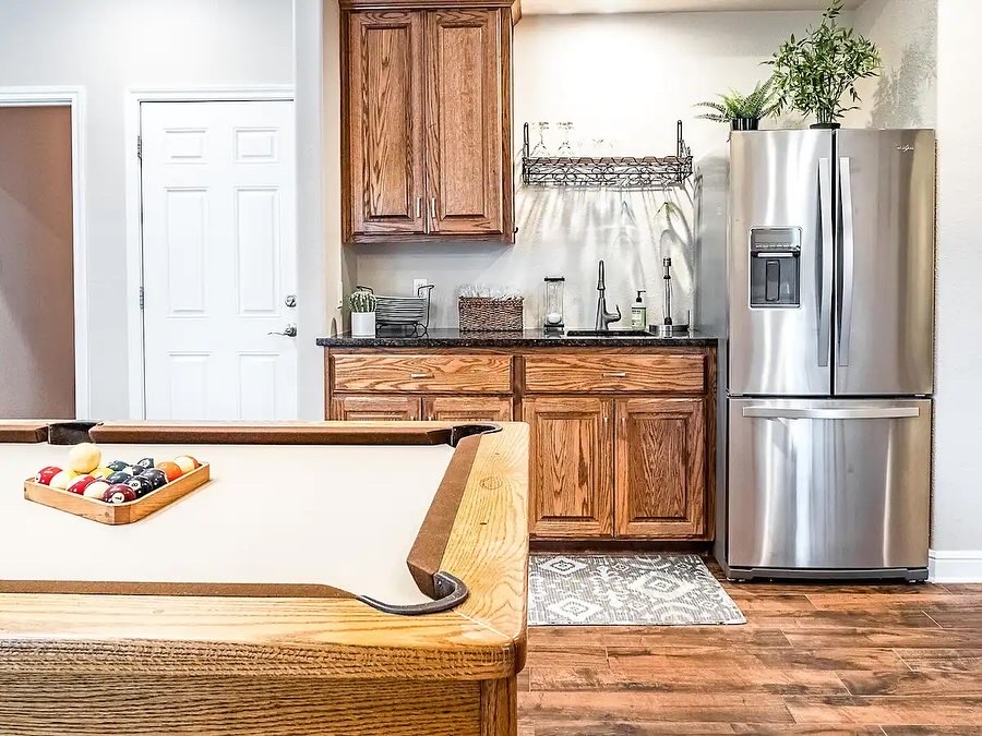 16308 Lake Loop Austin, TX 78734 - Photo 8 of 11 a kitchen with stainless steel appliances granite countertop a refrigerator and a stove