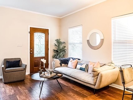 16308 Lake Loop Austin, TX 78734 - Photo 9 of 11 a living room with furniture and a wooden floor