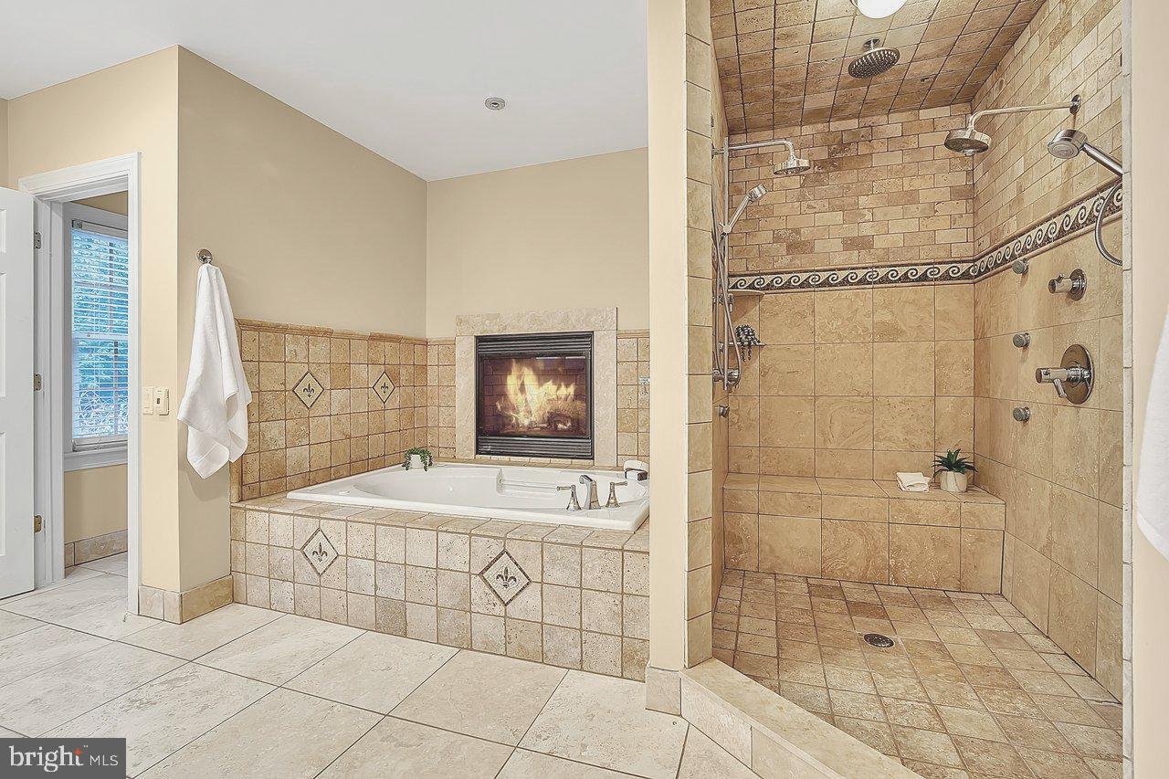 633 State Road Princeton, NJ 08540 - Photo 32 of 50 Primary bath with gas fire place walk-in showers