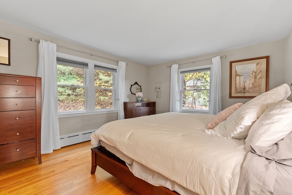 47 Summer Hill Road Maynard, MA 01754 - Photo 13 of 42 a bedroom with a bed and window with wooden floor