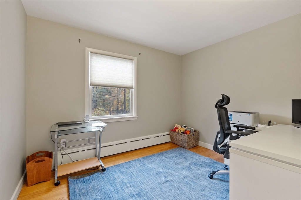 47 Summer Hill Road Maynard, MA 01754 - Photo 21 of 42 a room with chair and window