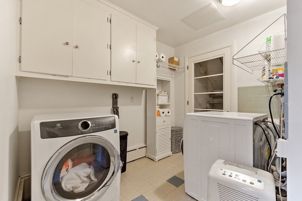 47 Summer Hill Road Maynard, MA 01754 - Photo 30 of 42 a utility room with dryer and washer