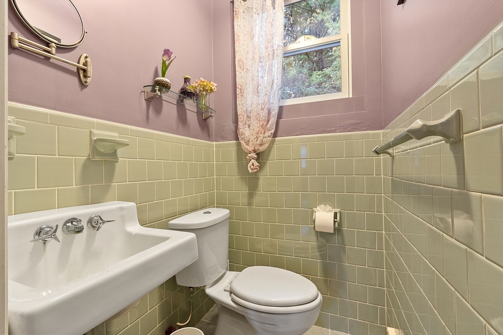 47 Summer Hill Road Maynard, MA 01754 - Photo 31 of 42 a bathroom with a sink a toilet and a shower