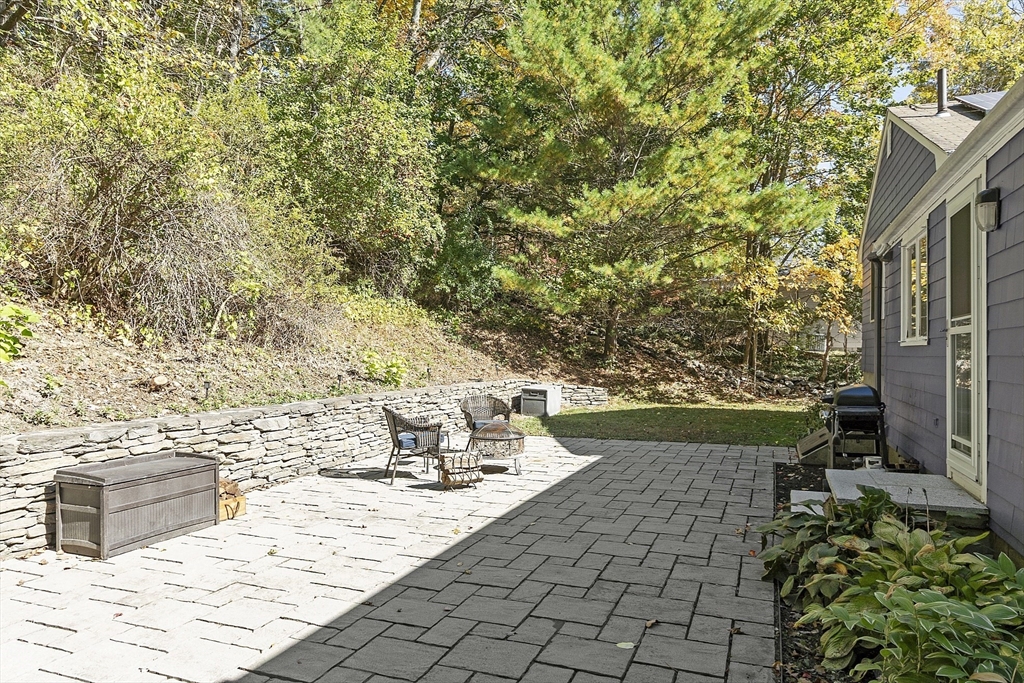 47 Summer Hill Road Maynard, MA 01754 - Photo 35 of 42 a view of a backyard with sitting area