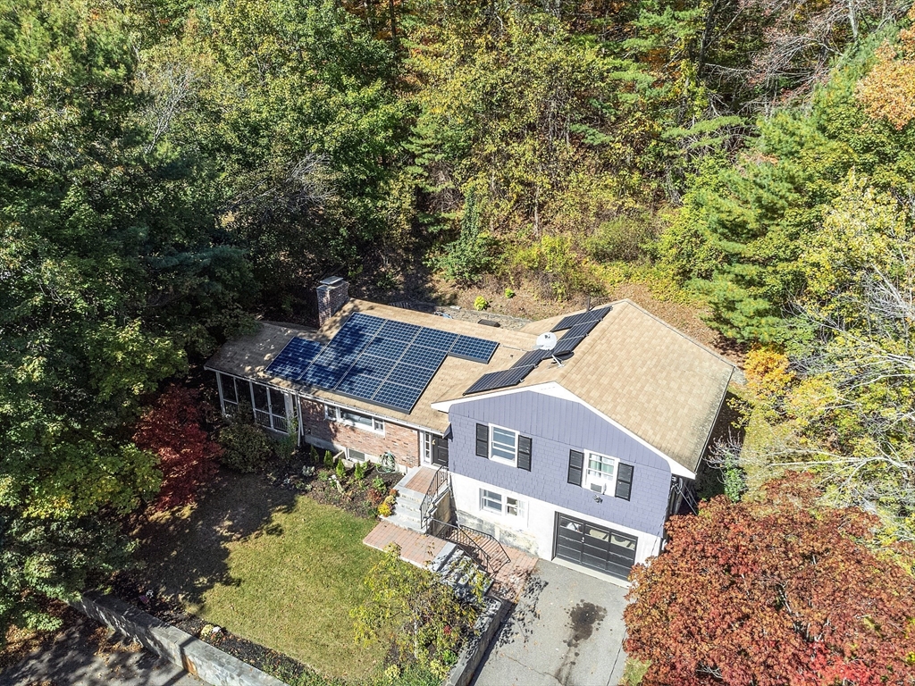47 Summer Hill Road Maynard, MA 01754 - Photo 38 of 42 an aerial view of a house with a yard basket ball court and outdoor seating